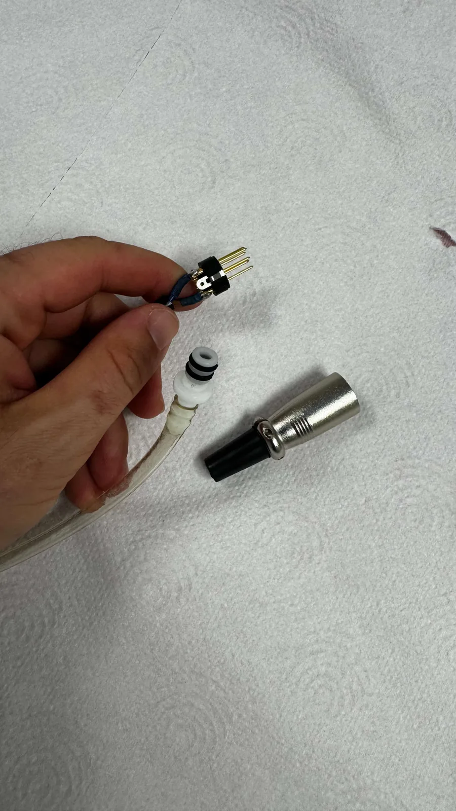 Dismantled Multipolar RF connector and pin
